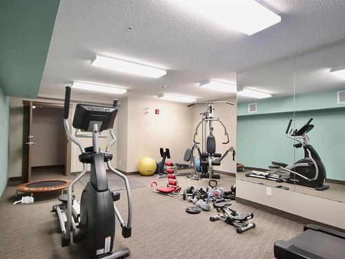 407 6070 Schonsee Way, Edmonton, AB - Indoor Photo Showing Gym Room