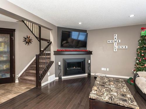 1926 57 Street, Edmonton, AB - Indoor Photo Showing Living Room With Fireplace