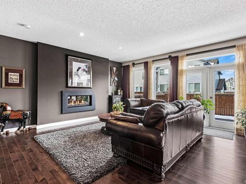 149 Sandalwood Crescent, Sherwood Park, AB - Indoor Photo Showing Living Room With Fireplace