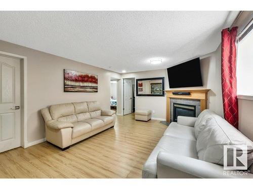 174 Ward Crescent, Edmonton, AB - Indoor Photo Showing Living Room With Fireplace