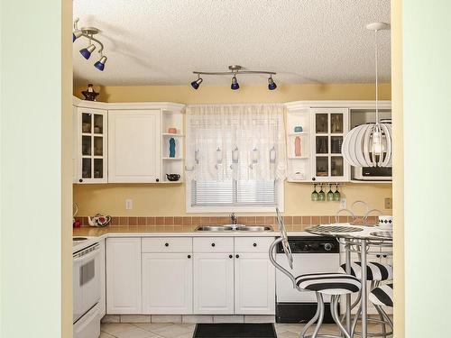 8904 170A Avenue, Edmonton, AB - Indoor Photo Showing Kitchen With Double Sink