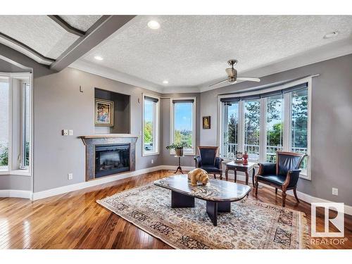 5508 Ada Boulevard, Edmonton, AB - Indoor Photo Showing Living Room With Fireplace