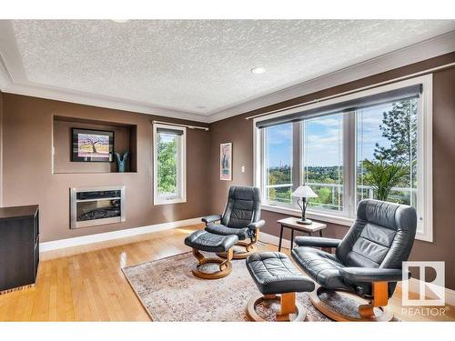 5508 Ada Boulevard, Edmonton, AB - Indoor Photo Showing Living Room With Fireplace