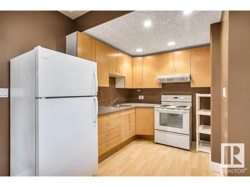 5508 Ada Boulevard, Edmonton, AB - Indoor Photo Showing Kitchen With Double Sink