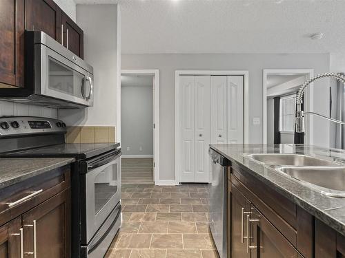 112 534 Watt Blvd Sw, Edmonton, AB - Indoor Photo Showing Kitchen With Double Sink