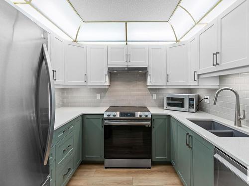 230 6703 172 Street, Edmonton, AB - Indoor Photo Showing Kitchen With Stainless Steel Kitchen With Double Sink With Upgraded Kitchen