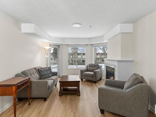 230 6703 172 Street, Edmonton, AB - Indoor Photo Showing Living Room With Fireplace