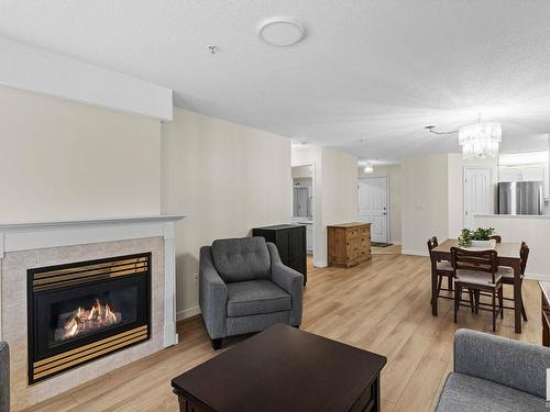 230 6703 172 Street, Edmonton, AB - Indoor Photo Showing Living Room With Fireplace