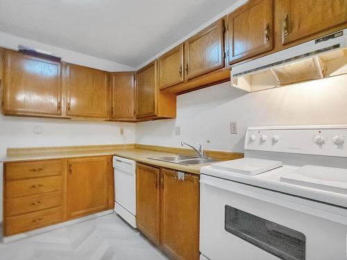 101 379 Woodbridge Way, Sherwood Park, AB - Indoor Photo Showing Kitchen With Double Sink