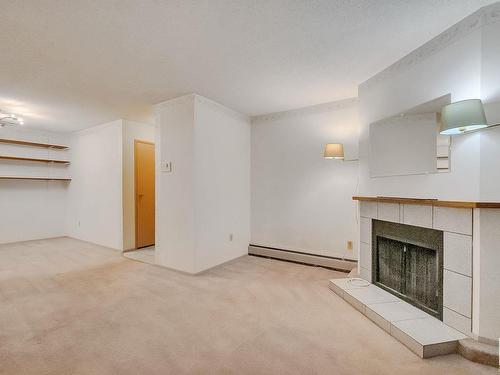 101 379 Woodbridge Way, Sherwood Park, AB - Indoor With Fireplace