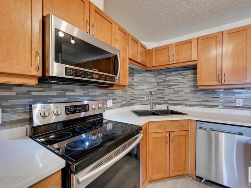 1212 7339 South Terwillegar Drive, Edmonton, AB - Indoor Photo Showing Kitchen With Double Sink