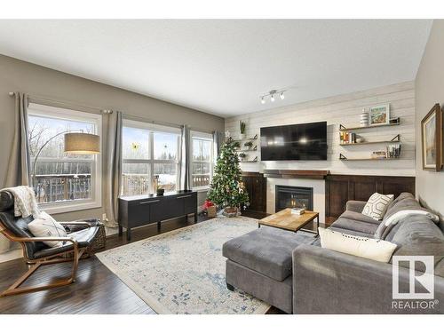 48 Newgate Way, St. Albert, AB - Indoor Photo Showing Living Room With Fireplace