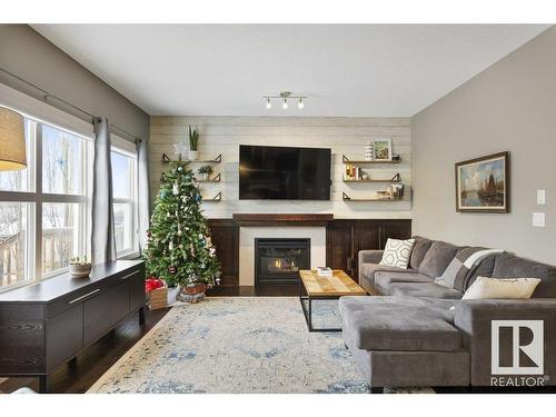 48 Newgate Way, St. Albert, AB - Indoor Photo Showing Living Room With Fireplace