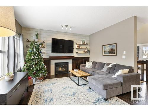 48 Newgate Way, St. Albert, AB - Indoor Photo Showing Living Room With Fireplace