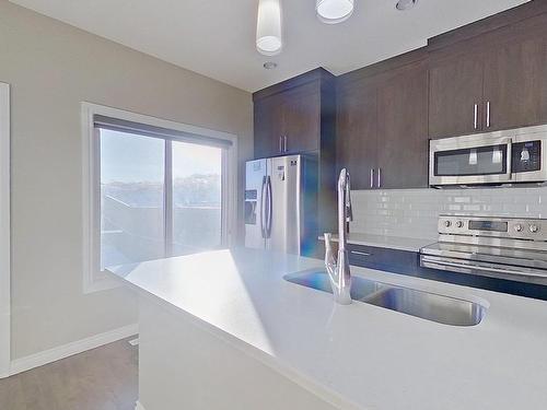 8767 Carson Way, Edmonton, AB - Indoor Photo Showing Kitchen With Double Sink With Upgraded Kitchen