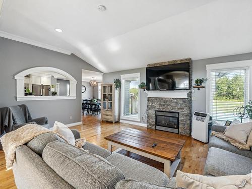 54 20508  Township Road 502, Rural Beaver County, AB - Indoor Photo Showing Living Room With Fireplace