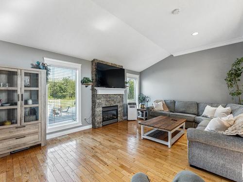 54 20508  Township Road 502, Rural Beaver County, AB - Indoor Photo Showing Living Room With Fireplace