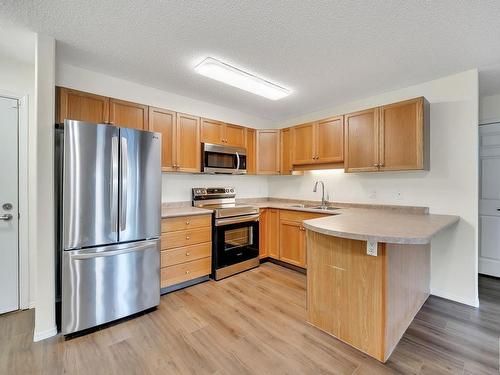 112 13635 34 Street, Edmonton, AB - Indoor Photo Showing Kitchen With Double Sink