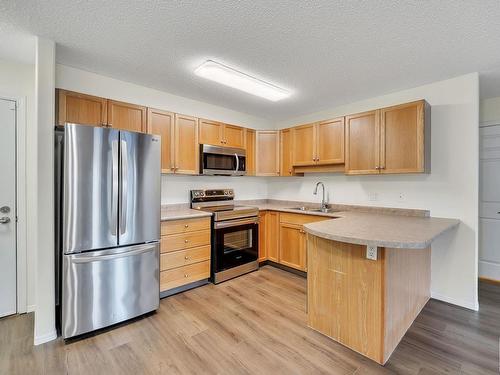 112 13635 34 Street, Edmonton, AB - Indoor Photo Showing Kitchen With Double Sink