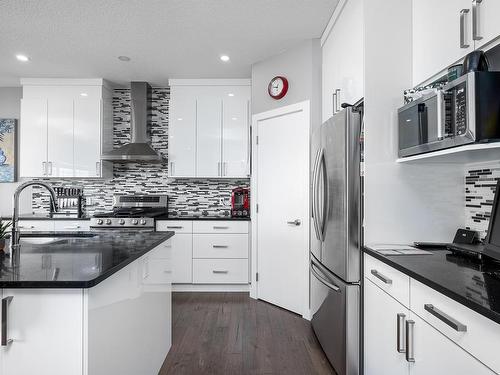 4723 35 Street, Beaumont, AB - Indoor Photo Showing Kitchen With Double Sink With Upgraded Kitchen