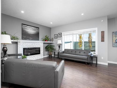 4723 35 Street, Beaumont, AB - Indoor Photo Showing Living Room With Fireplace