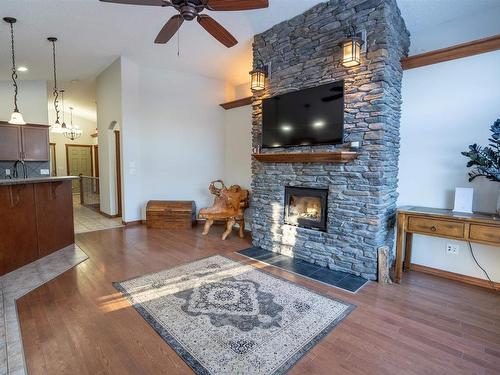 21 54514 Rge Rd 12, Rural Lac Ste. Anne County, AB - Indoor Photo Showing Living Room With Fireplace