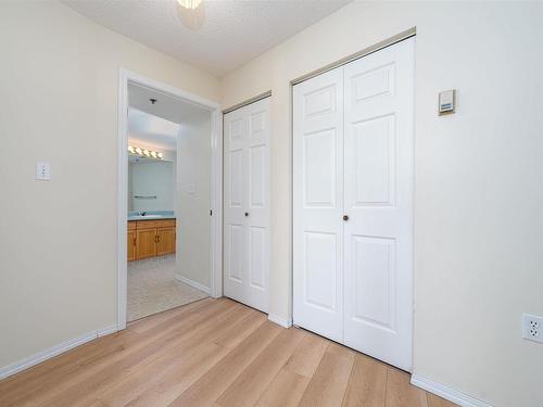 212 9926 100 Avenue, Fort Saskatchewan, AB - Indoor Photo Showing Other Room