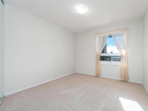 212 9926 100 Avenue, Fort Saskatchewan, AB - Indoor Photo Showing Other Room