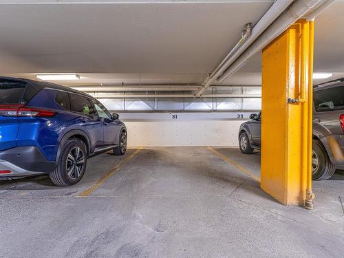 212 9926 100 Avenue, Fort Saskatchewan, AB - Indoor Photo Showing Garage