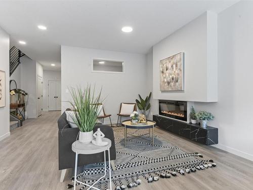 9226 Pear Drive, Edmonton, AB - Indoor Photo Showing Living Room With Fireplace