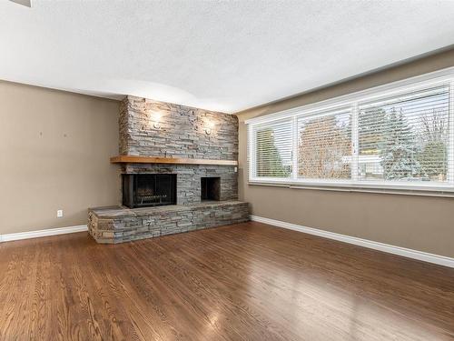 8111 145 Street, Edmonton, AB - Indoor Photo Showing Living Room With Fireplace