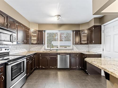 8111 145 Street, Edmonton, AB - Indoor Photo Showing Kitchen With Double Sink With Upgraded Kitchen