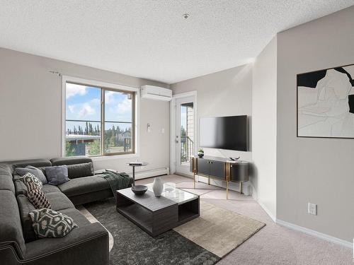 214 12025 22 Avenue, Edmonton, AB - Indoor Photo Showing Living Room