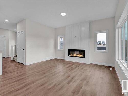 10 Brickyard Way, Stony Plain, AB - Indoor Photo Showing Living Room With Fireplace