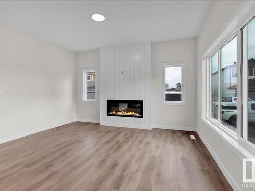 10 Brickyard Way, Stony Plain, AB - Indoor Photo Showing Living Room With Fireplace