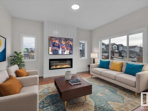 10 Brickyard Way, Stony Plain, AB - Indoor Photo Showing Living Room With Fireplace