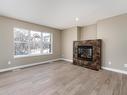 116 61 Street, Edmonton, AB  - Indoor Photo Showing Living Room With Fireplace 