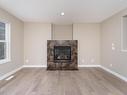 116 61 Street, Edmonton, AB  - Indoor Photo Showing Living Room With Fireplace 