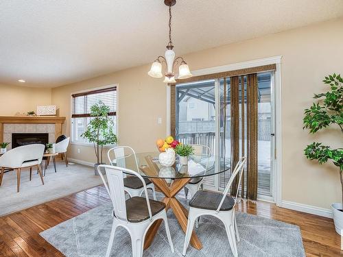 1120 117 Street, Edmonton, AB - Indoor Photo Showing Dining Room With Fireplace