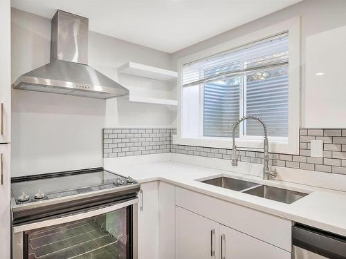 9907 170 Avenue, Edmonton, AB - Indoor Photo Showing Kitchen With Double Sink