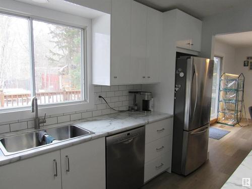 303 57312 Range Road 25, Rural Barrhead County, AB - Indoor Photo Showing Kitchen With Double Sink