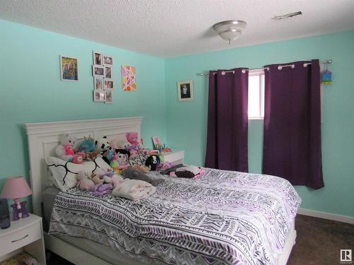 303 57312 Range Road 25, Rural Barrhead County, AB - Indoor Photo Showing Bedroom