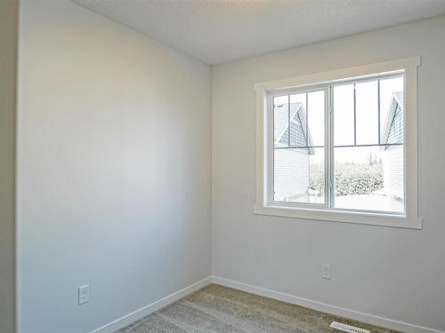 82 50 Mclaughlin Drive, Spruce Grove, AB - Indoor Photo Showing Other Room