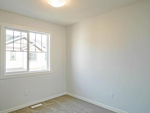 82 50 Mclaughlin Drive, Spruce Grove, AB - Indoor Photo Showing Other Room