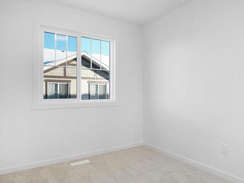 82 50 Mclaughlin Drive, Spruce Grove, AB - Indoor Photo Showing Other Room