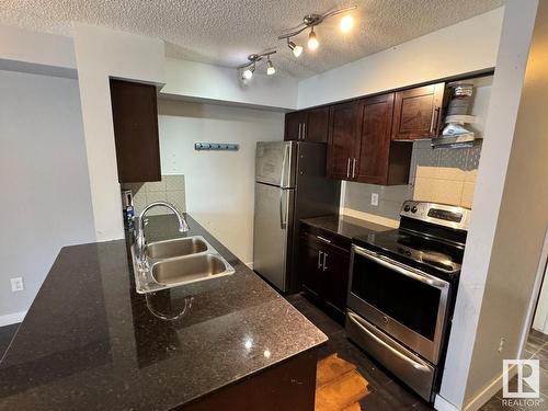 217 274 Mcconachie Drive, Edmonton, AB - Indoor Photo Showing Kitchen With Double Sink