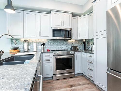 306 71 Festival Way, Sherwood Park, AB - Indoor Photo Showing Kitchen With Double Sink With Upgraded Kitchen