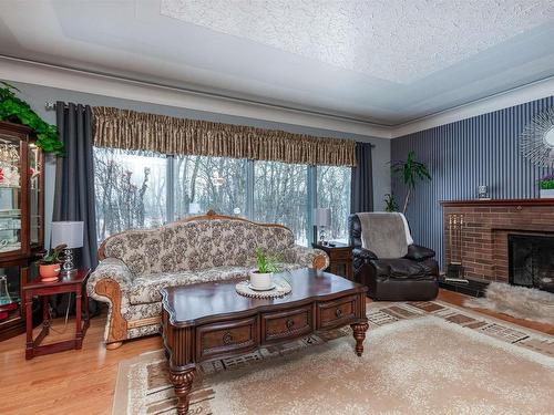 325 52306 Rge Road 212, Rural Strathcona County, AB - Indoor Photo Showing Living Room With Fireplace