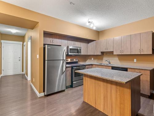 514 10518 113 Street, Edmonton, AB - Indoor Photo Showing Kitchen With Double Sink