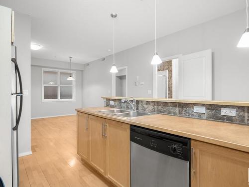 307 10503 98 Avenue, Edmonton, AB - Indoor Photo Showing Kitchen With Double Sink